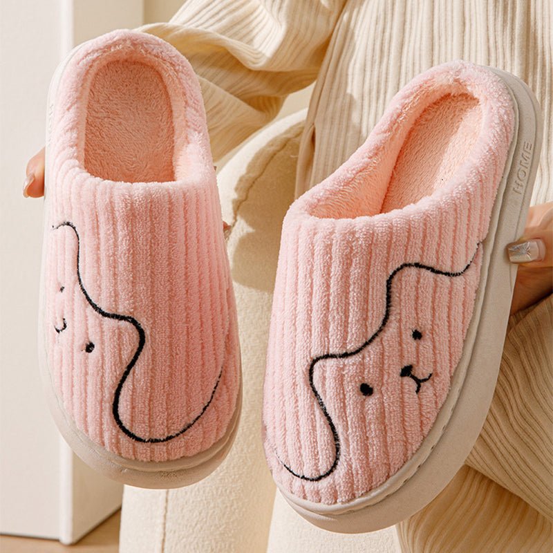 Pair of Cozy Striped Cat Slippers for Couples by Ancient Energy, featuring plush interior, non-slip soles, and colorful striped design.