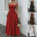Elegant polka-dot off-shoulder dress by Ancient Energy featuring a strapless, high-waist design for party, beach, or holiday wear.