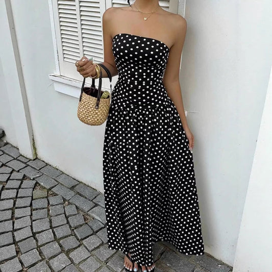 Elegant polka-dot off-shoulder dress by Ancient Energy featuring a strapless, high-waist design for party, beach, or holiday wear.