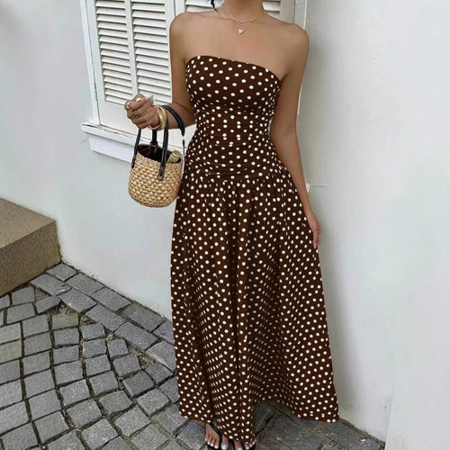 Elegant polka-dot off-shoulder dress by Ancient Energy featuring a strapless, high-waist design for party, beach, or holiday wear.