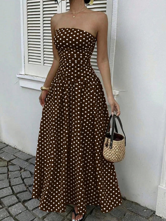 Elegant polka-dot off-shoulder dress by Ancient Energy featuring a solid color, strapless, high-waist design suitable for parties or holidays.