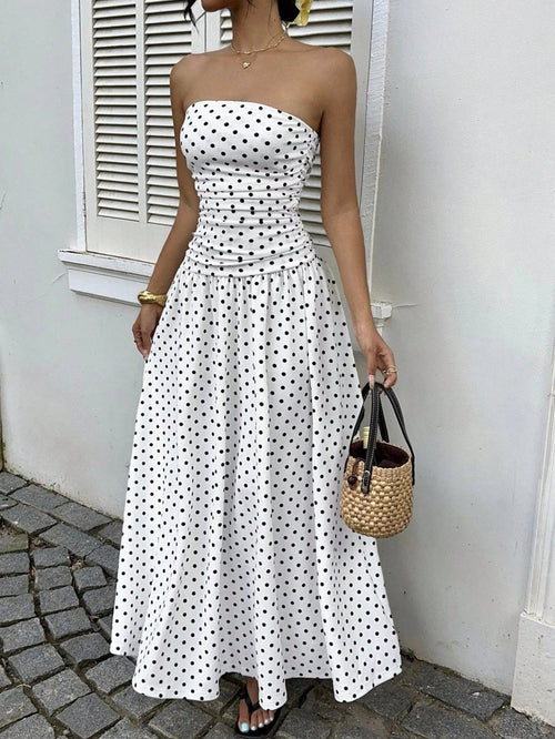 Elegant polka-dot off-shoulder dress by Ancient Energy featuring a high-waist strapless design, perfect for parties and beach holidays.
