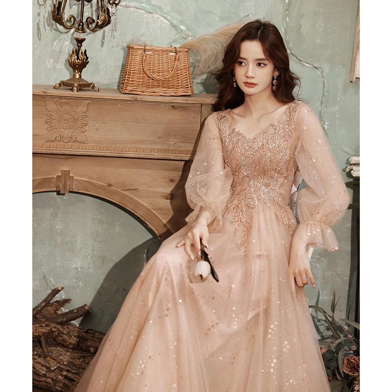 Ancient Energy fairy princess pink dress for children featuring a flowing skirt and delicate details, perfect for costumes or dress-up.
