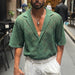 Ancient Energy men's casual short-sleeved shirt with hollow-out breathable fabric and lapel collar, perfect for summer wear.
