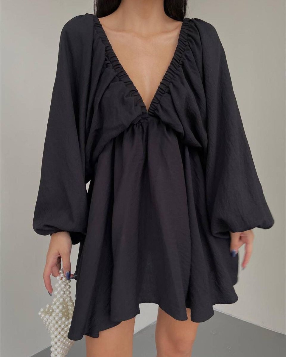 Elegant V-neck lantern sleeve dress for women by Ancient Energy, featuring a stylish fit and flowing fabric.