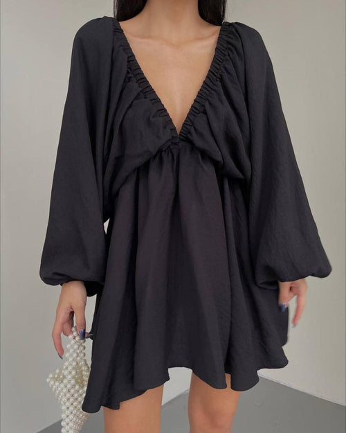 Elegant V-neck lantern sleeve dress for women by Ancient Energy, featuring a stylish fit and flowing fabric.