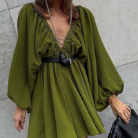 Elegant women's V-neck lantern sleeve dress by Ancient Energy, featuring a stylish silhouette and flowing fabric.