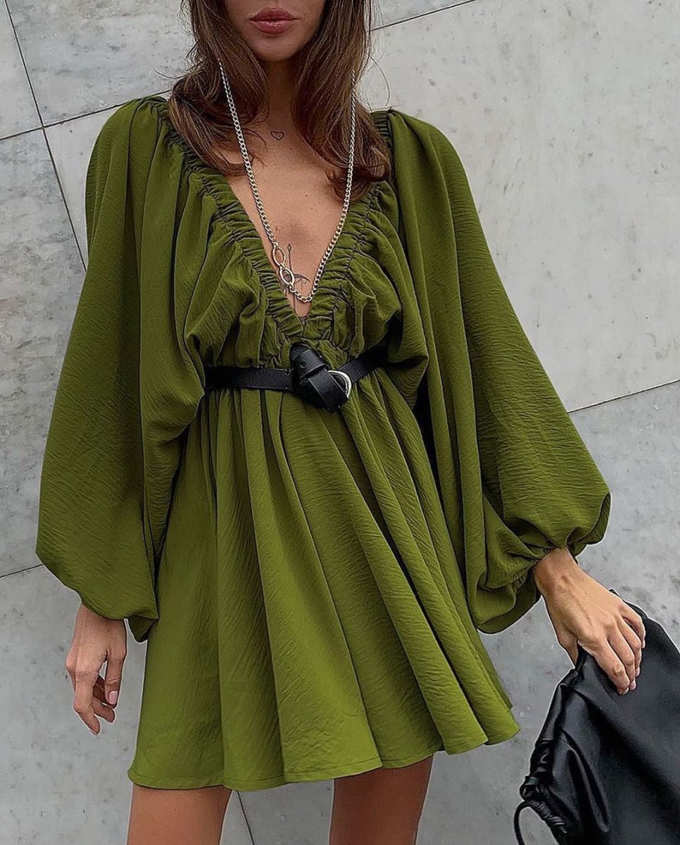 Elegant women's V-neck lantern sleeve dress by Ancient Energy, featuring a stylish silhouette and flowing fabric.