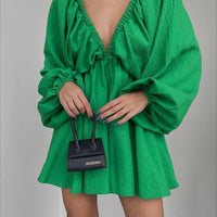 Elegant women's V-neck lantern sleeve dress by Ancient Energy, featuring a stylish and fashionable design.