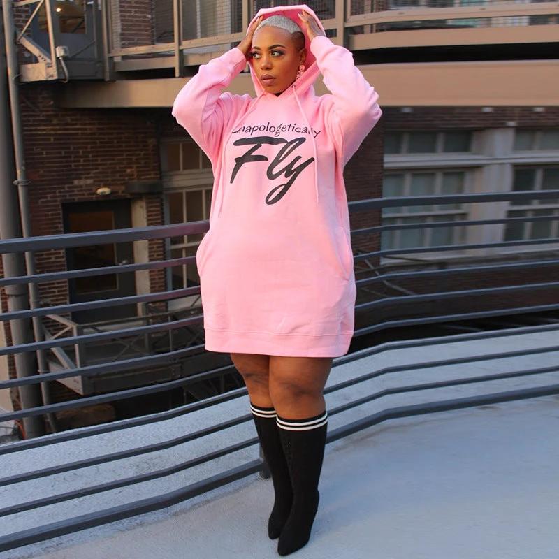 Plus size women's hoodie by Ancient Energy featuring a comfortable hooded top with a relaxed fit and casual blouse design.