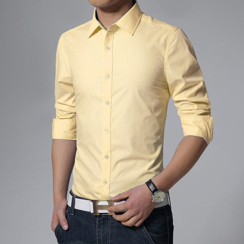 Ancient Energy French dress shirt for formal tuxedo occasions, featuring a classic white design with a pointed collar and button front.