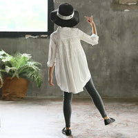 Girls' big kids loose fashionable Korean style tops with swallowtail design, by Ancient Energy, shown on a model.