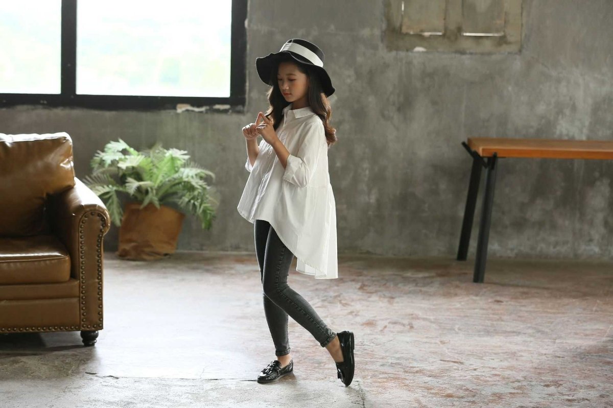 Girls' big kids loose Korean style tops with swallowtail design, by Ancient Energy, featuring fashionable and comfortable casual shirts.