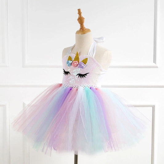 Girls' dress by Ancient Energy, featuring a colorful, playful design, perfect for casual or special occasions.