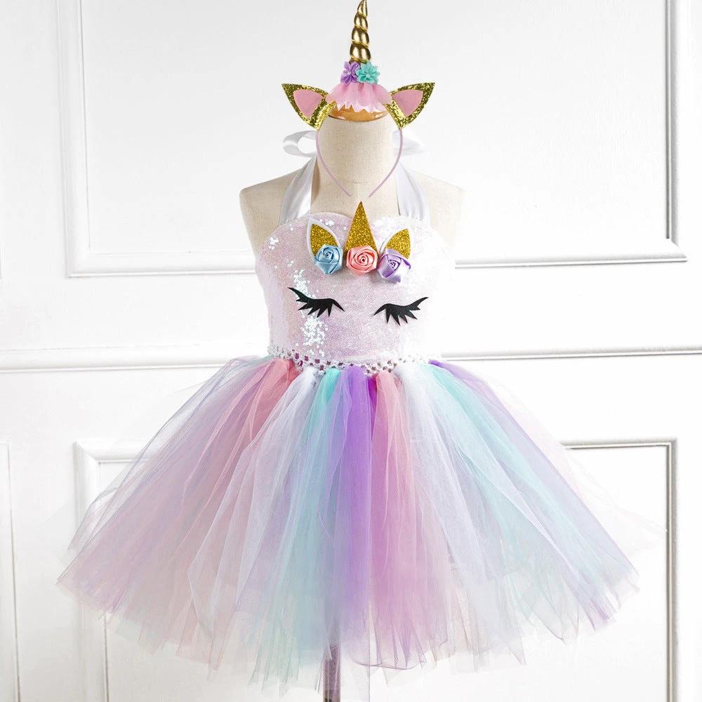 Girls' dress from Ancient Energy featuring a colorful floral pattern and lightweight fabric, perfect for spring or summer wear.