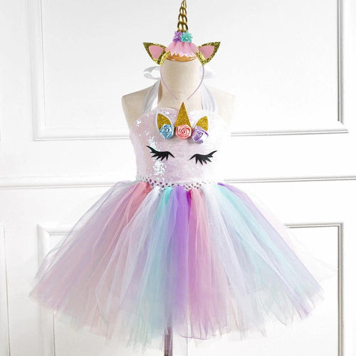 Girls' dress from Ancient Energy featuring a colorful floral pattern and lightweight fabric, perfect for spring or summer wear.