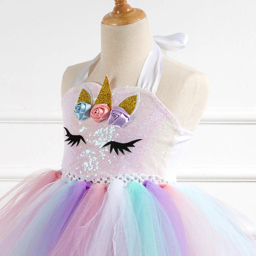Girls' dress by Ancient Energy, featuring a colorful floral pattern and soft fabric, suitable for casual or special occasions.