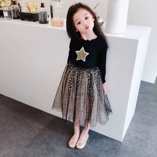 Girls' dress in size 0 by Ancient Energy, featuring a colorful floral pattern and soft fabric suitable for young children.