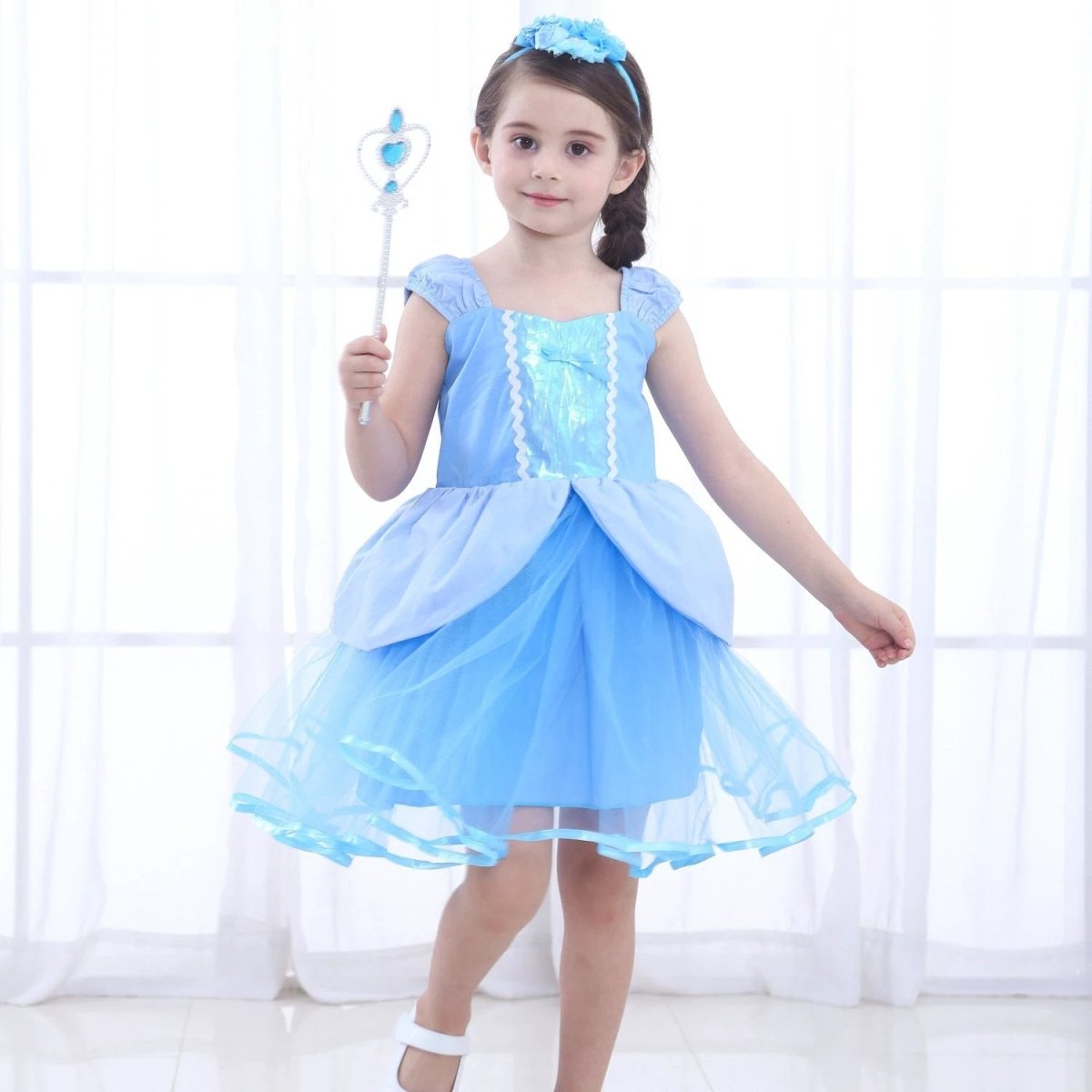 Girls' dress by Ancient Energy featuring a colorful floral pattern and a comfortable, stylish design for young girls.