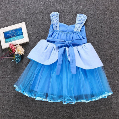 Girls' dress by Ancient Energy, featuring a stylish design suitable for young girls, displayed in a vibrant, colorful fabric.