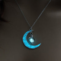 Silver plated glowing pendant necklace with chain from Ancient Energy, featuring a luminous pendant design.