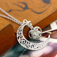 Silver plated glowing pendant necklace with chain from Ancient Energy, featuring a luminous pendant on a sleek silver chain.