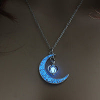 Silver plated glowing pendant necklace with chain from Ancient Energy, featuring a luminous pendant design.