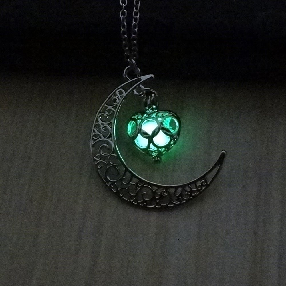 Silver plated glowing pendant necklace with chain from Ancient Energy, featuring a luminous pendant design.