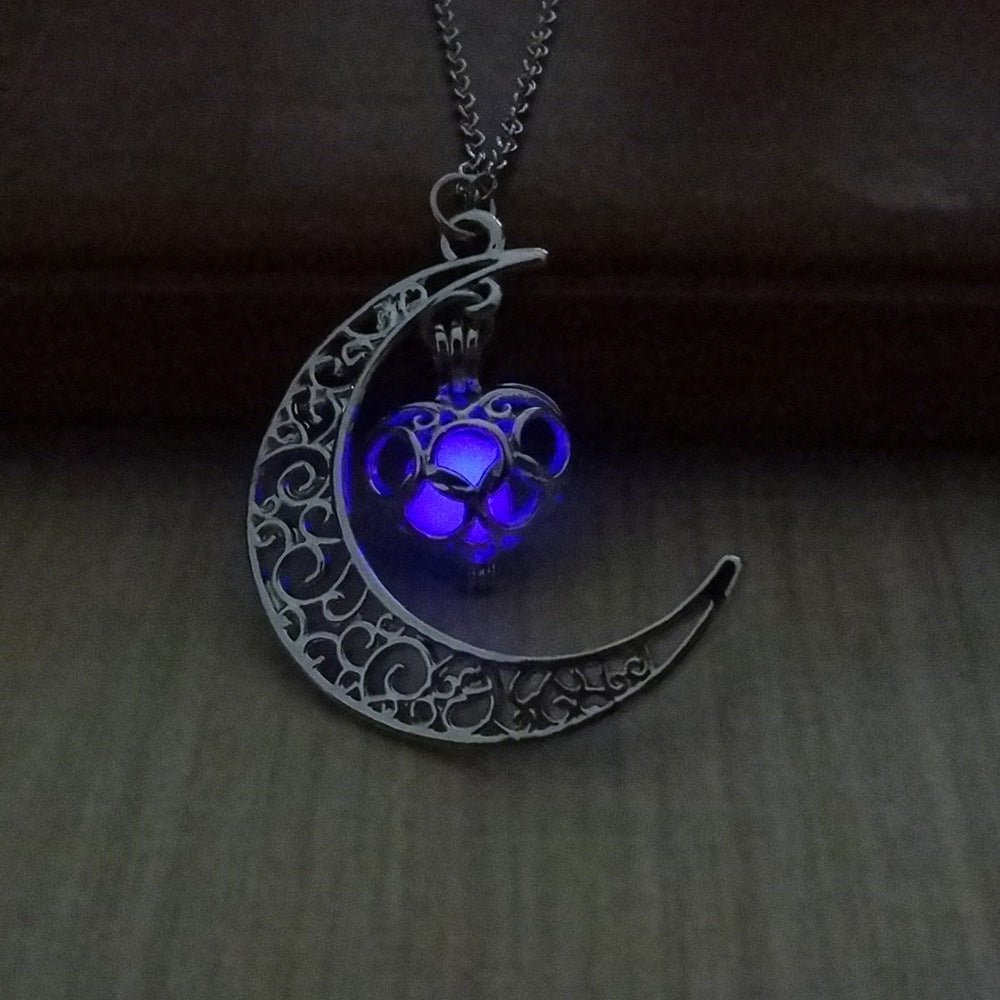 Silver plated glowing pendant necklace with chain from Ancient Energy, featuring a luminous pendant against a plain background.