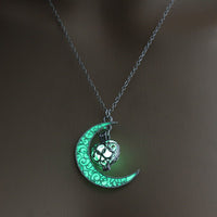 Silver plated glowing pendant necklace with chain from Ancient Energy, showcasing a luminous pendant on a sleek chain.
