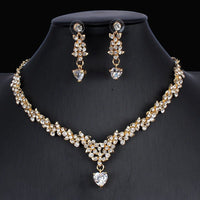 Ancient Energy golden zircon bridal jewelry set with matching necklace and earrings for wedding or special occasions.