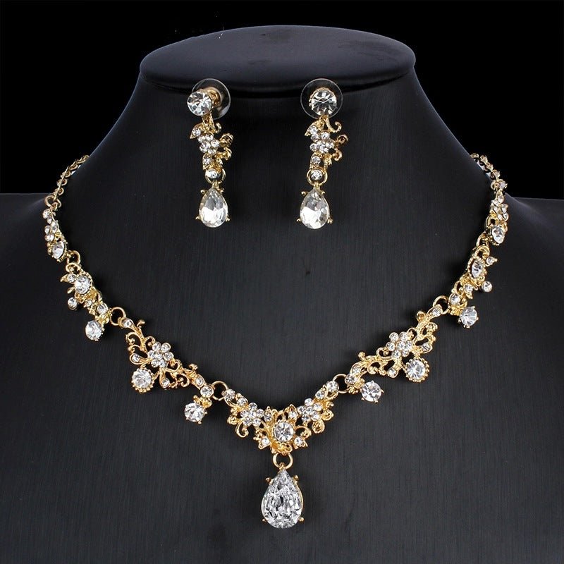 Golden zircon bridal jewelry set with matching necklace and earrings, featuring elegant design for wedding and special occasions.