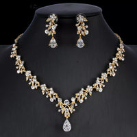 Golden zircon bridal jewelry set with matching necklace and earrings by Ancient Energy, perfect for wedding accessories.