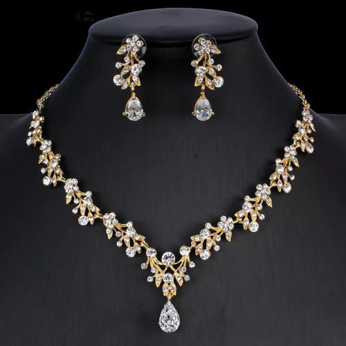 Golden zircon bridal jewelry set with matching necklace and earrings by Ancient Energy, perfect for wedding accessories.