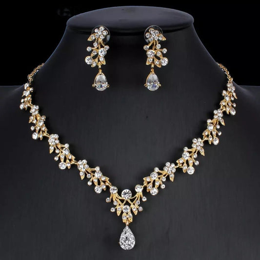 Golden zircon bridal jewelry set with matching necklace and earrings by Ancient Energy, perfect for wedding accessories.