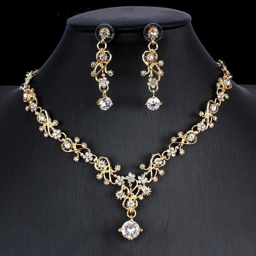 Golden zircon bridal jewelry set featuring a necklace and matching earrings by Ancient Energy for wedding occasions.