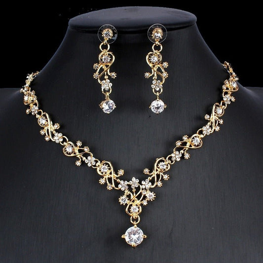 Golden zircon bridal jewelry set featuring a necklace and matching earrings by Ancient Energy for wedding occasions.