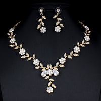 Golden zircon bridal jewelry set with matching necklace and earrings, featuring elegant design for wedding or special occasions.