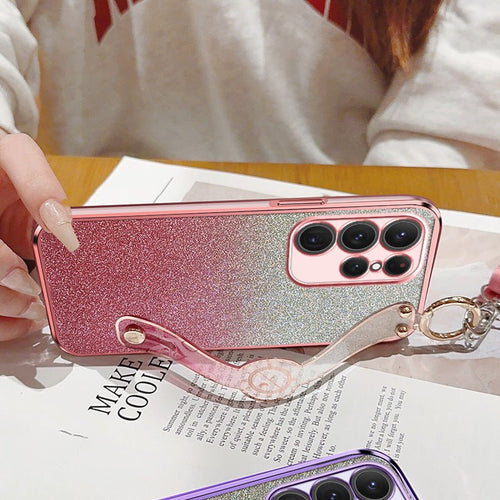 Gradient glitter wristband cross-body lanyard phone case by Ancient Energy with colorful shimmering design and adjustable strap.