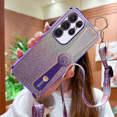 Gradient glitter wristband cross body lanyard phone case by Ancient Energy with colorful sparkling design.