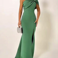 Green bow-tie tube top evening dress by Ancient Energy featuring a fitted silhouette and elegant style for formal occasions.