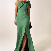 Green bow tube top evening dress by Ancient Energy featuring a fitted silhouette and elegant design for formal occasions.