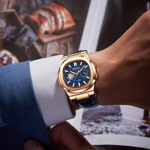 Ancient Energy mechanical watch with sun, moon, and stars design, waterproof leather strap and detailed dial.