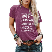 Ladies blouse by Ancient Energy featuring letter printing, round neck, short sleeves, casual T-shirt style.