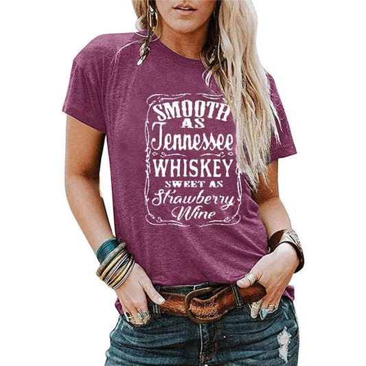 Ladies blouse by Ancient Energy featuring letter printing, round neck, short sleeves, casual T-shirt style.