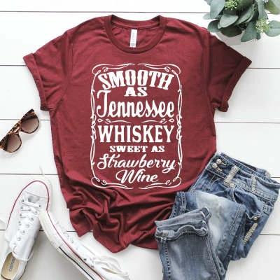 Ladies blouse by Ancient Energy with letter printing, round neck, short sleeves, casual T-shirt style for women.
