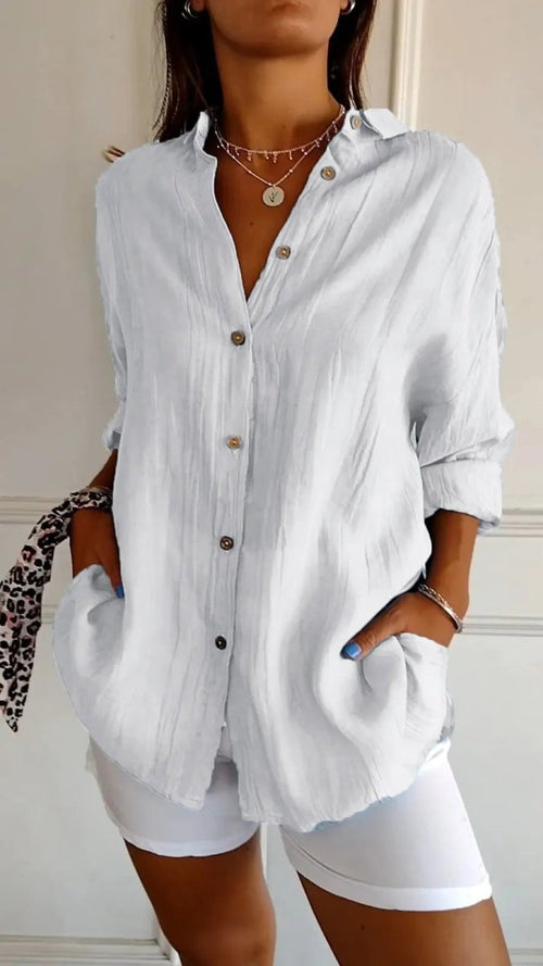 Ancient Energy women's lapel long sleeve shirt with single-breasted design and pleated front, stylish shirt tops for women.