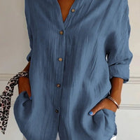 Women's Ancient Energy long sleeve lapel shirt with single-breasted design and pleated front, stylish and comfortable for everyday wear.