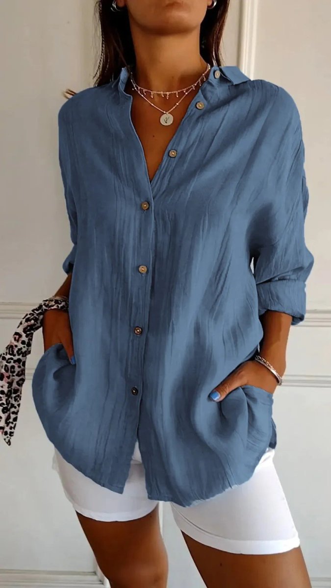 Women's Ancient Energy long sleeve lapel shirt with single-breasted design and pleated front, stylish and comfortable for everyday wear.
