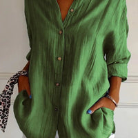 Women's Ancient Energy lapel long sleeve shirt with single-breasted design and pleated front, stylish and comfortable for casual wear.
